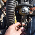 When we are inspecting the engine for leaks where should we look for those leaks?