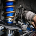 When performing a complete steering and suspension inspection you should check?