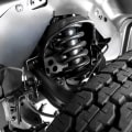 How do you inspect steering and suspension components?