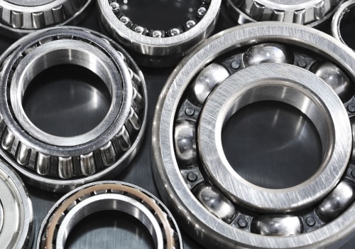 How should used wheel bearings cleaned before inspection?