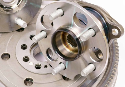 How does a technician check for a loose wheel bearing?